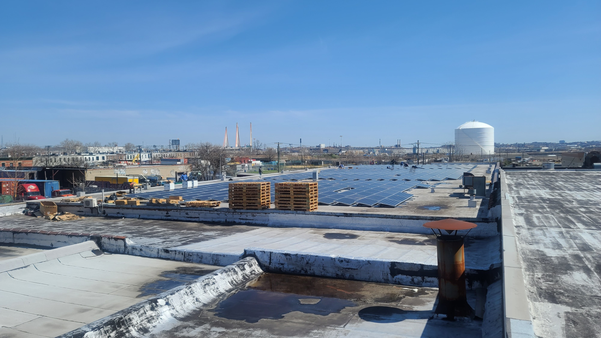 Kamtech Solar after image showing a completed commercial rooftop solar panel installation with a fully mounted photovoltaic system.