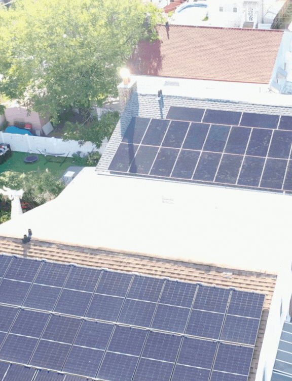 Drone video of Kamtech Solar residential rooftop system featuring high-efficiency solar panels generating clean, renewable home energy. Drone video of Kamtech Solar residential rooftop system featuring high-efficiency solar panels generating clean, renewable home energy.