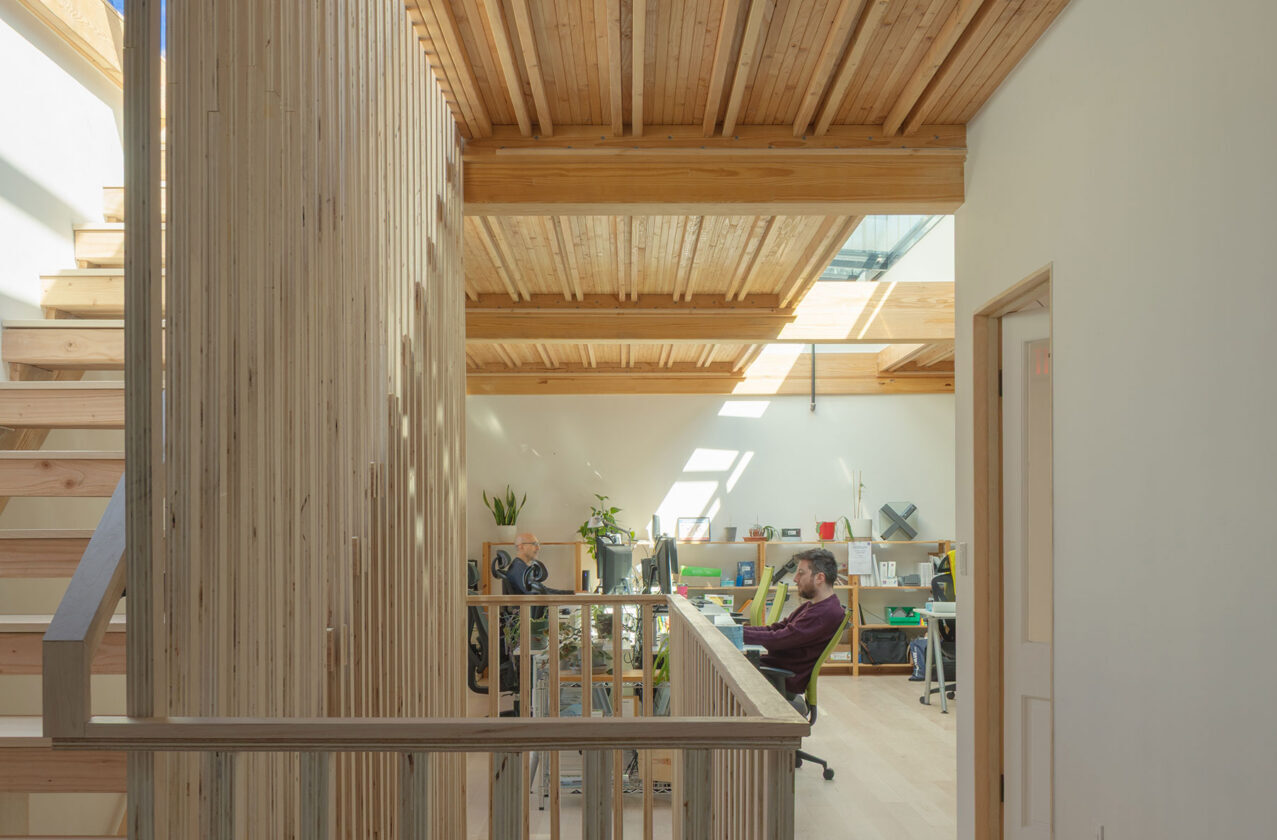 Interior staircase and exposed mass timber ceiling at 475 High Performance Building Supply headquarters, Brooklyn NY — designed and built by 475 High Performance Building Supply